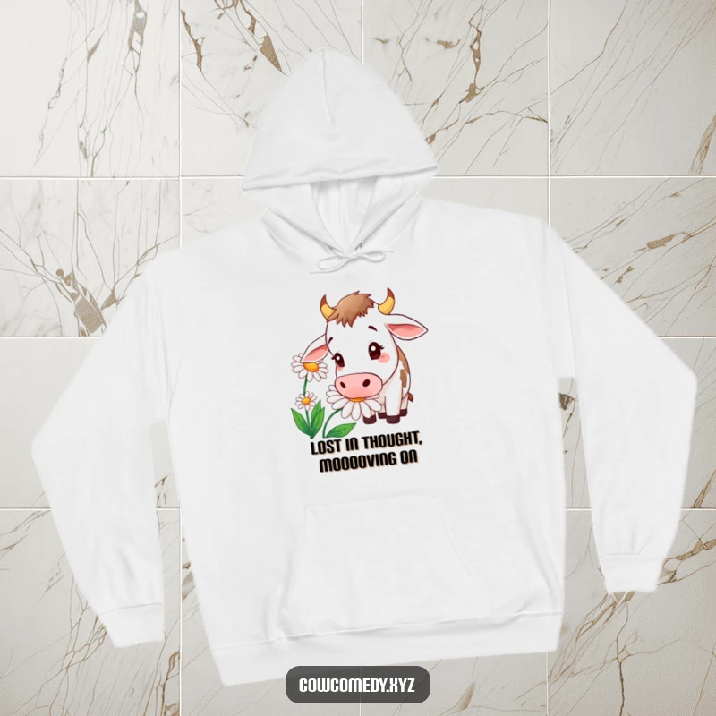 Funny cow hoodie, cozy and warm, depicts a curious cow sniffing an oversized daisy with great interest.
