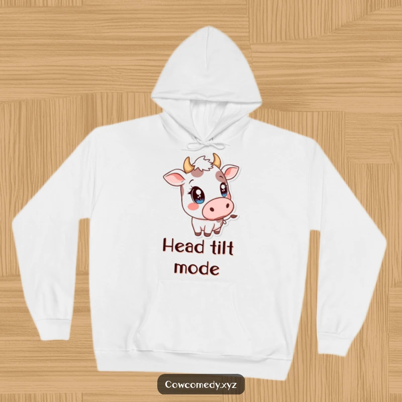 Funny Kawaii Cow Hoodie: Comfortable sweatshirt featuring a cow with big, sparkly eyes tilting its head curiously.