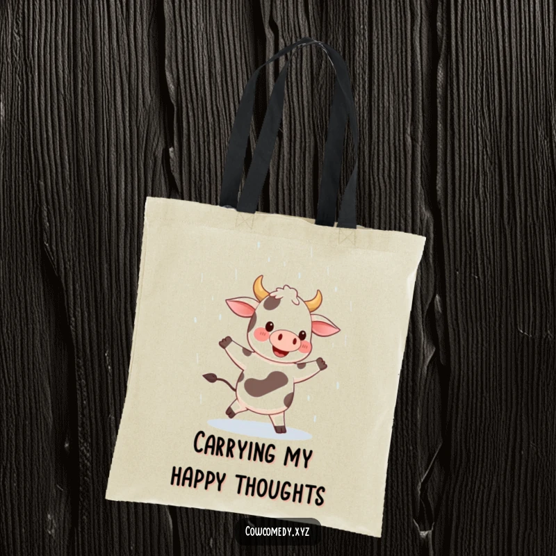 Funny tote bag showcasing a happy cow character dancing enthusiastically in the rain with a broad smile, spreading pure joy and cheer.